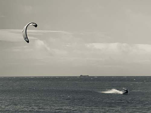 leisure activities person on water at daytime gliding